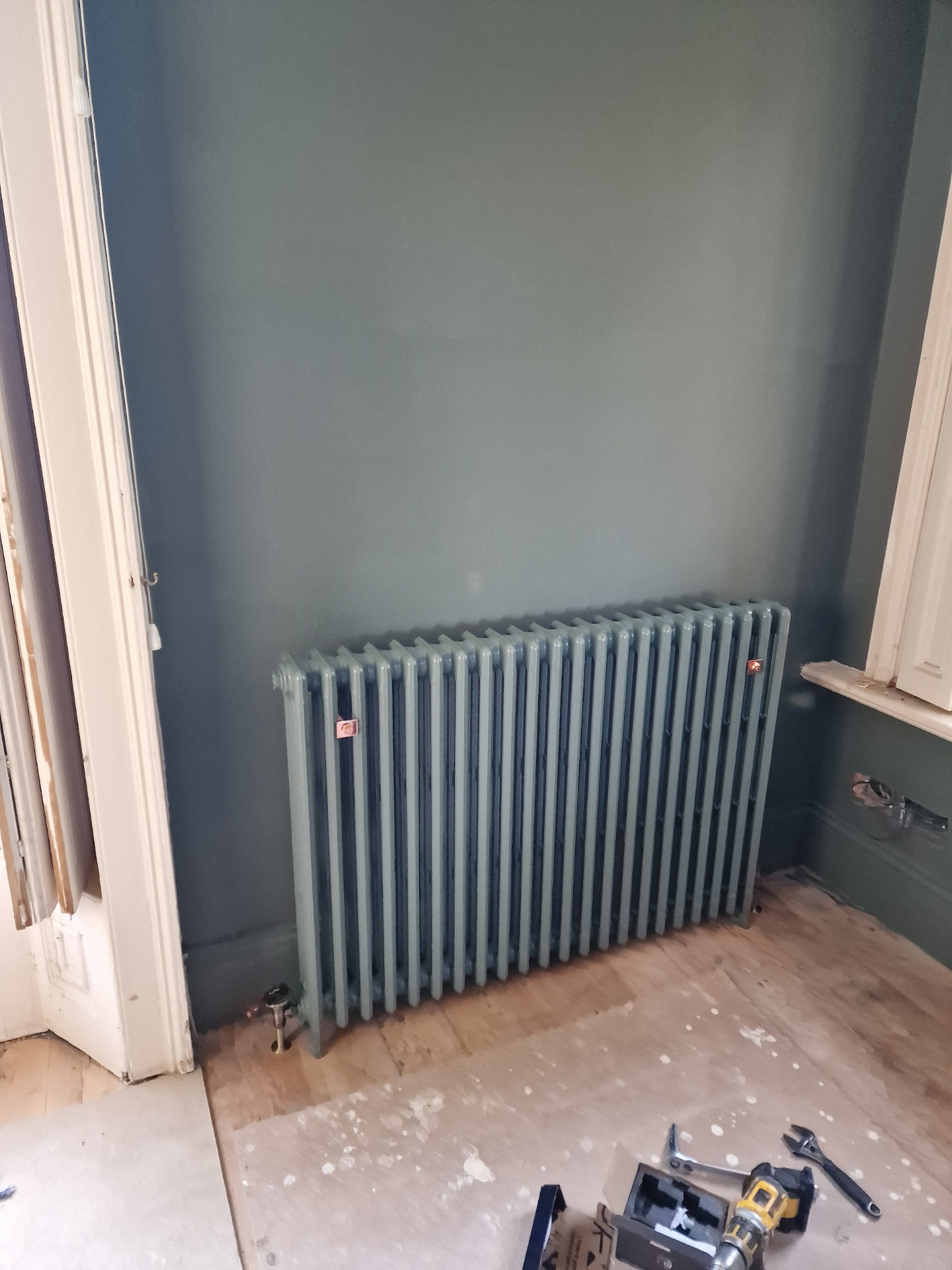 Cast iron radiator installation, Warwickshire